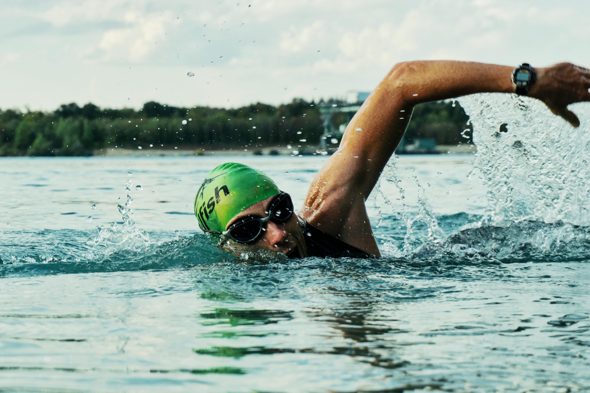 Open-water swimmer mid-stroke during an endurance swim
